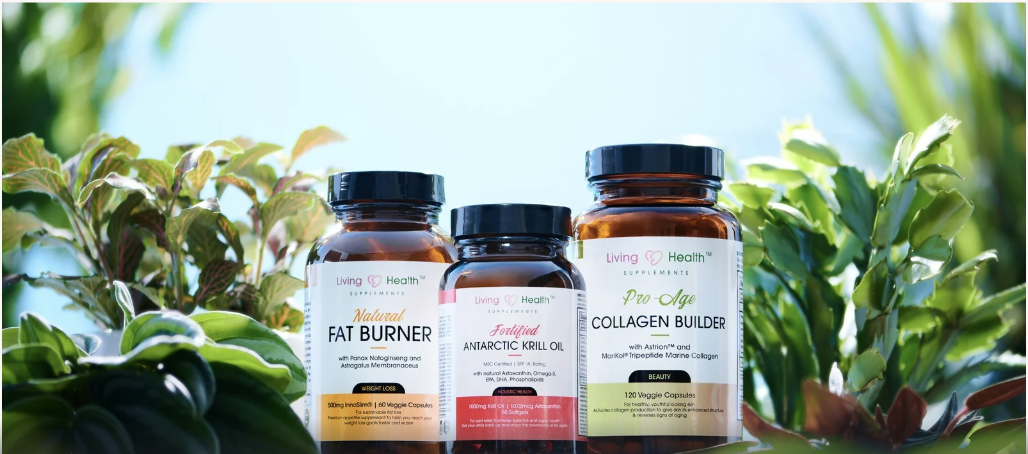 Living Health supplement bottles among plants